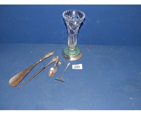 A small quantity of silver items to include a shoe horn and a button hook with silver handles, a baby pusher and "Little Miss