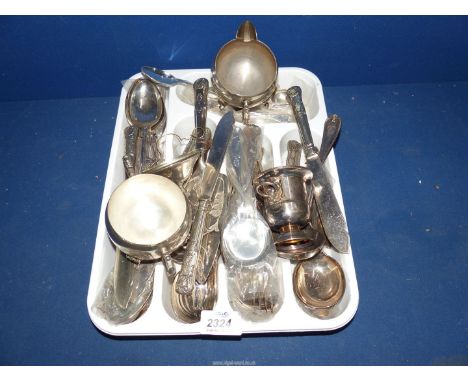 A quantity of plated cutlery to include: Kings pattern, Kit Cats Club ladle, sucrier, milk jug, etc.