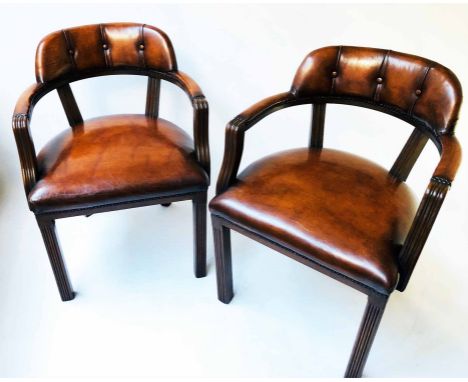 DESK/LIBRARY ARMCHAIRS, a pair, George III design mahogany framed and hand finished leaf brown studded leather upholstered wi