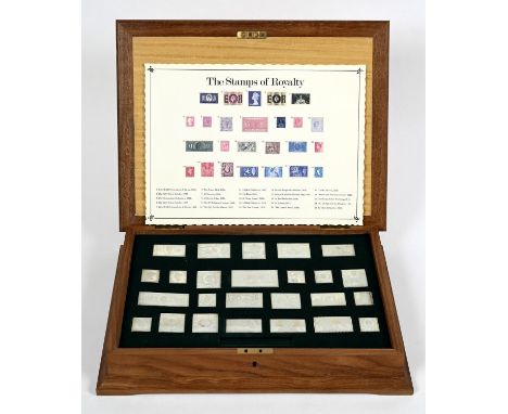 CASED SILVER STAMPS - THE STAMPS OF ROYALTY 25 silver replicas of British stamps, with a card index of the different types an