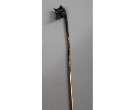 15CT GOLD STICK PIN - FOX a 15ct gold and rose diamond Fox head stick pin, stamped 15ct. 6cms long