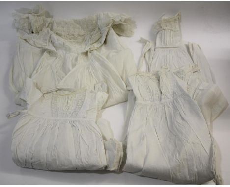VINTAGE CHILDREN'S CLOTHING including a qty of late 19thc Christening gowns and petticoats, a cream fringed silk shawl, a lac