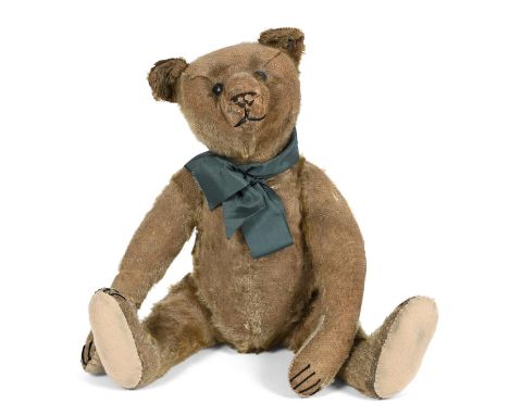 EARLY STEIFF TEDDY BEAR circa 1910-1914, with black boot button eyes and cone shaped snout, with elongated limbs and a growle