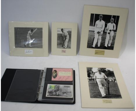 CRICKET AUTOGRAPHS an album with various Cricket autographs (some signed on photographs), including Don Bradman, Garry Sobers