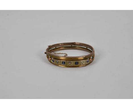 An antique 9ct rose gold, sapphire and diamond hinged bangle (damaged)  