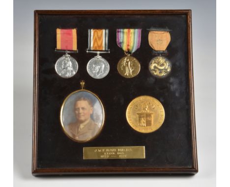 A framed Victorian &amp; George V medal group including Boxer Rebellion  belonging to Lt. Colonel IMS John Walter Forbes Rait