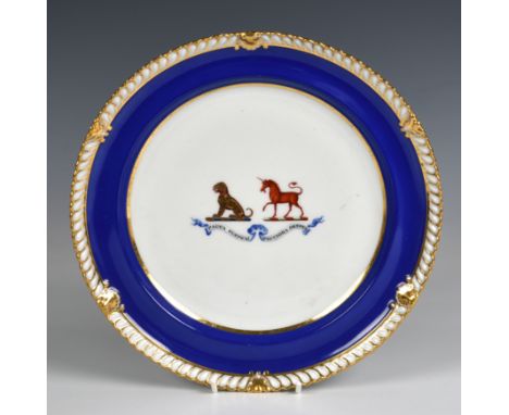 A Chamberlain's Worcester armorial plate  printed script c.1811-1840 mark, painted with a seated dog and a unicorn above the 