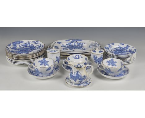 Royal Worcester "Blue Dragon" pattern part tea service  comprising eight cups, fourteen saucers, ten side plates, cream jug, 