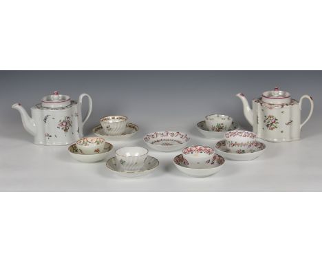 Two New Hall porcelain teapots  early 19th century, both of serpentine form, the covers with onion finials, painted with spra