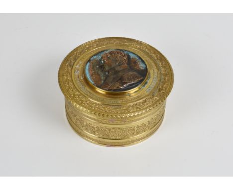 Napoleonic interest - A 19th century French gilt bronze circular box  the lidded top centred by a bronze portrait medallion o