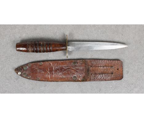 Second World War variant Fairbairn Sykes 2nd pattern fighting knife  6 1/8in. (16.6cm.) steel blade, broad oval wooden shaped