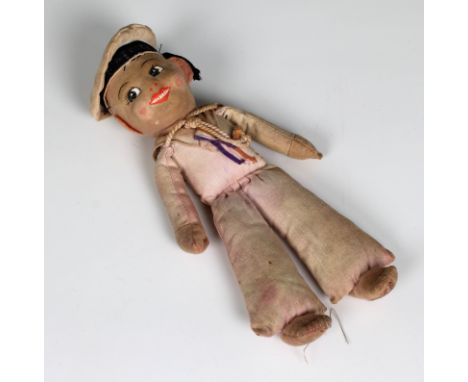 A stuffed Chad Valley cloth toy sailor given to the vendor on board HMS Nelson when the battleship was visiting Guernsey in t
