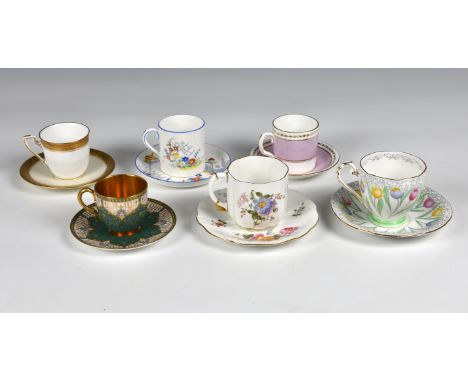 A collection of six various porcelain coffee and tea cups with saucers,  including two Royal Worcester and one Crown Derby.  