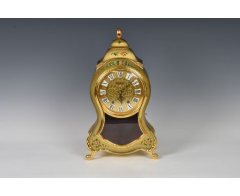 A Bucherer bracket or mantel clock, with bracket  20th century, the gilt dial with enamel Roman numerals, signed 'Bucherer', 