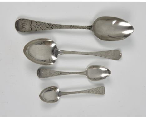 A collection of four Channel Island silver spoons  to include a pair of bright cut Old English pattern teaspoons, maker's mar