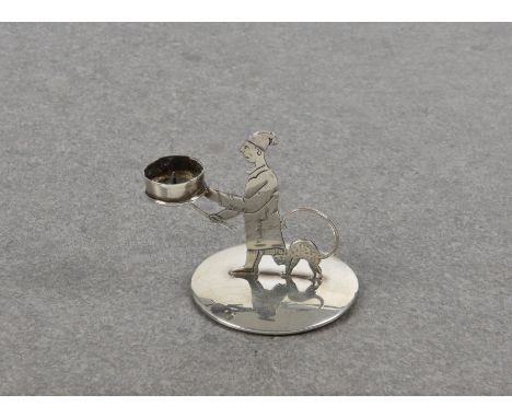 An Edwardian novelty miniature silver chamberstick  Probably fashioned on Wee Willie Winkie, the handle being his cats tail, 