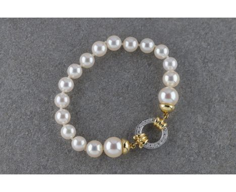 Taverna Gioielli: an 18ct yellow and white gold cultured pearl and diamond bracelet,  the knotted string of seventeen graduat