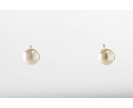 A pair of silver and freshwater pearl stud earrings,  each pearl approx 5.9mm, post and butterfly fittings  