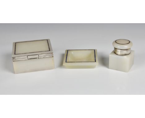 An Art Deco white onyx, lapis lazuli and silver part desk set  maker CB&amp;S, London 1924 &amp; 1926, the white onyx with la