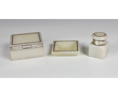 An Art Deco white onyx, lapis lazuli and silver part desk set  maker CB&amp;S, London 1924 &amp; 1926, the white onyx with la