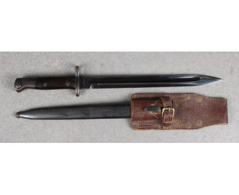 A German MP34 bayonet single edged 28cm. fullered blade, stamped to ricasso Simson &amp; Co Suhl, metal mounted wooden slab h