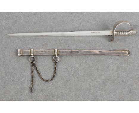 Military interest - A rare Victorian novelty silver letter knife / opener fashioned as a heavy cavalry officer’s basket-hilt 