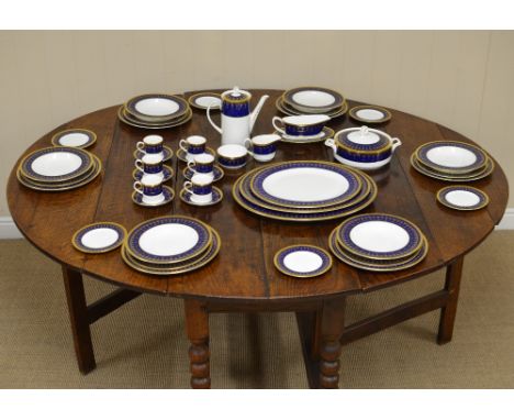 A Royal Worcester fine bone china 'Imperial Blue' Dinner Service having intricate gold border design on cobalt blue ground, t