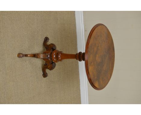 A Victorian walnut Pillar Table with moulded circular top on turned column and carved tripod base, 1ft 10in D