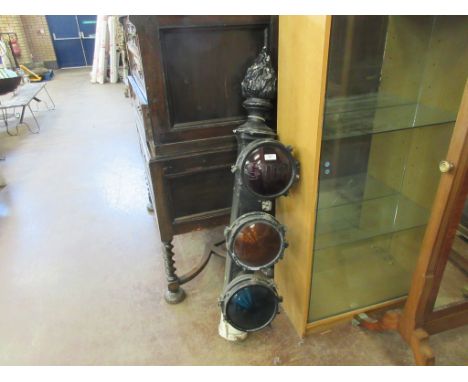 A set of Victorian black painted Traffic Lights with flame design finial, fitted for electricity, 4ft 9in H