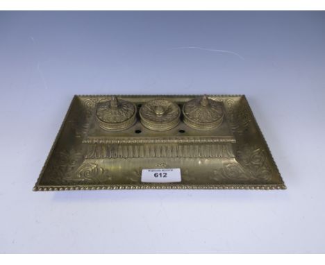 A 19th Century cast brass Inkstand with pair of lidded inkwells flanking a sander, rope twist and beaded friezes, 10 1/2in
