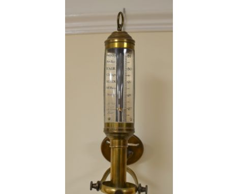A 19th Century brass Ship's Barometer by R.M. Desterro, Lisbon, mounted on a gimble, 3ft high