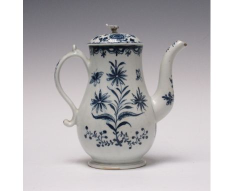 A rare Lowestoft porcelain Coffee Pot and Cover, c.1765-70, painted in blue with oriental flowering shrubs to each side and s