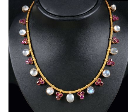 A Moonstone and Ruby Necklace claw-set eleven moonstone cabochons interspersed with trios of round rubies