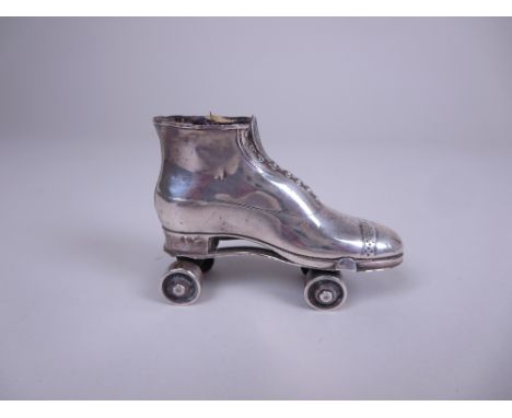 An Edward VII silver Pin Cushion in form of a roller skate, Birmingham 1908, Rgd No 535766