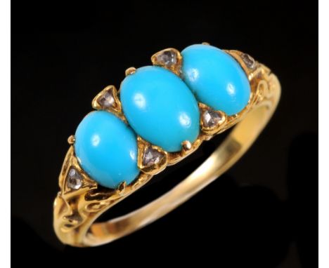 A Turquoise three stone Ring claw-set graduated oval cabochons with rose-cut diamond points between in pierced mount, ring si