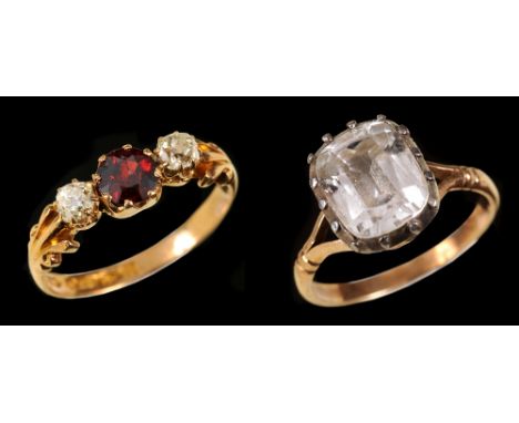 A Ruby and Diamond three stone Ring claw-set round ruby between two old-cut diamonds in 18ct gold, ring size N, and a Dress R