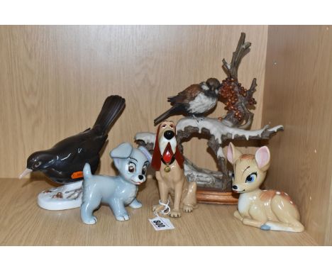 A GROUP OF FIVE ANIMAL THEMED ORNAMENTS to include a group of three Wade Disney animals comprising Bambi, Scamp, and Trusty t