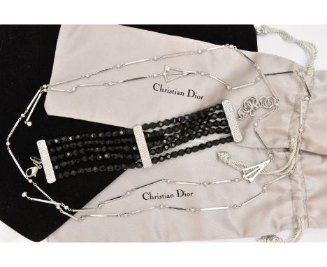 A 'CHRISTIAN DIOR' NECKLACE AND BRACELET, a white metal art deco style lariat necklace, approximate length 1220mm, signed 'Di