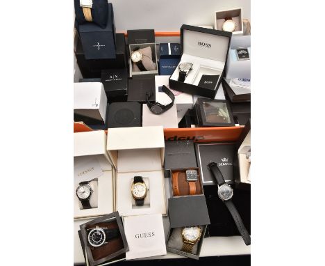 A LARGE BOX OF ASSORTED FASHION WRISTWATCHES, a large assortment of branded fashion watches, most with boxes, names to includ