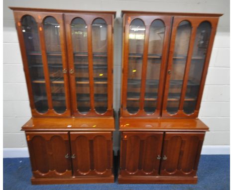 TWO DUCAL CANALETTO DISPLAY CABINETS, each fitted with double glass doors, and double cupboard doors, width 94cm x depth 47cm