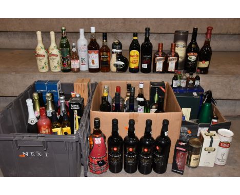 A large collection of assorted ALCOHOL containing fifty-one bottles, comprising 1 x 1 litre presentation bottle of The Famous