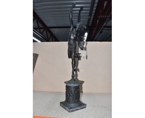 AFTER GIAMBOLOGNA, A LATE NINETEENTH CENTURY BRONZED CAST METAL SCULPTURE OF 'HERMES ON THE WINDS OF AEOLUS' stood on a relie