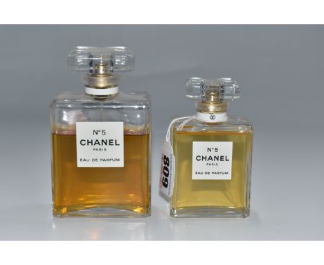 TWO PARTIALLY USED CHANEL 'No. 5' EAU DE PARFUM BOTTLES comprising a 100ml and 50ml bottle with stoppers (2) Condition Report