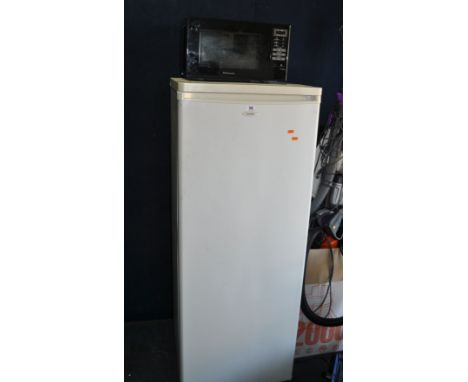 A MATSUI LARDER FREEZER, width 55cm, depth 55cm, height 140cm (PAT pass and working at -22 degrees) and a Panasonic microwave