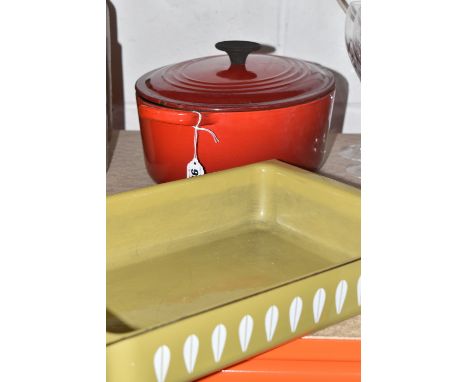 A CATHERINE HOLM ENAMEL DISH AND A LE CREUSET CASSEROLE DISH, the Catherine Holm of Norway green enamel oven dish in Lotus pa