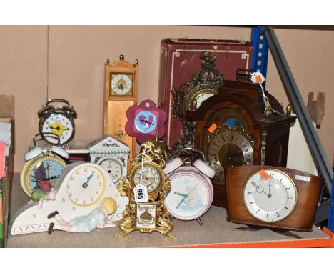 A COLLECTION OF ASSORTED CLOCKS to include a Portmeirion 'Botanic Garden' mantel clock, a Charpente for Walt Disney Company '