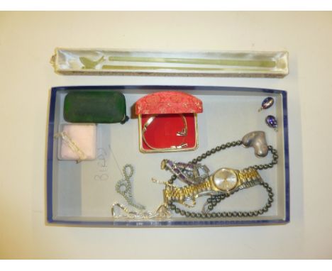 Two trays of various costume jewellery; a wrist watch; two enamelled pendants; jade items etc.