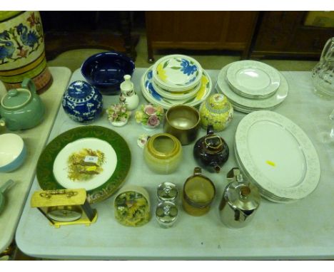 A quantity of floral decorated plates; two ginger jars;  floral encrusted ornaments; two Royal Worcester egg coddlers etc.