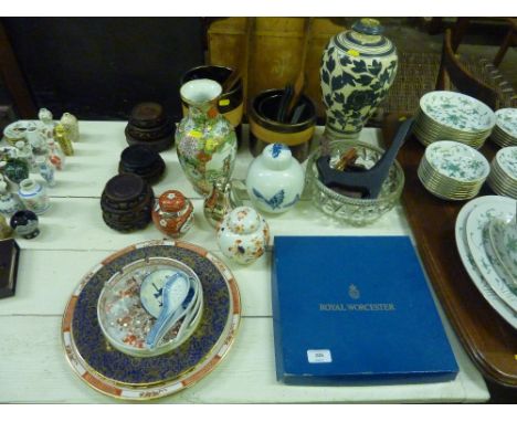 A Royal Worcester cake plate; a quantity of Oriental hardwood stands; various decorative plates; vases etc.