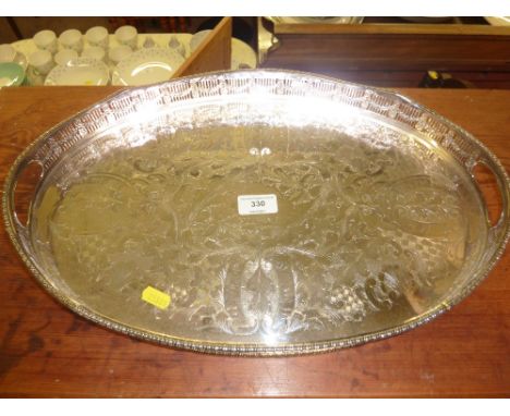 A silver plated two handled tray with pierced gallery together with a Continental porcelain table lamp and shade, AF